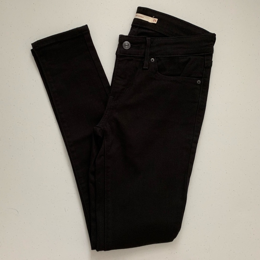 Levi’s 711 Skinny Stretch jeans in black, size 25